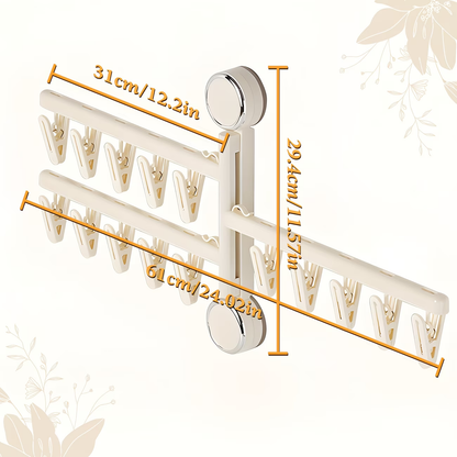 Foldable wall-mounted clothes rack with strong suction cups, saving space.